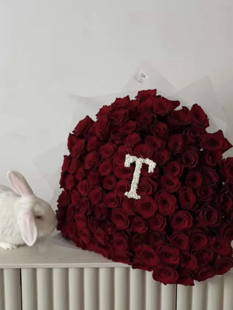 Luxury 100 red roses with letter design arranged by Boston Flowers for Boston delivery