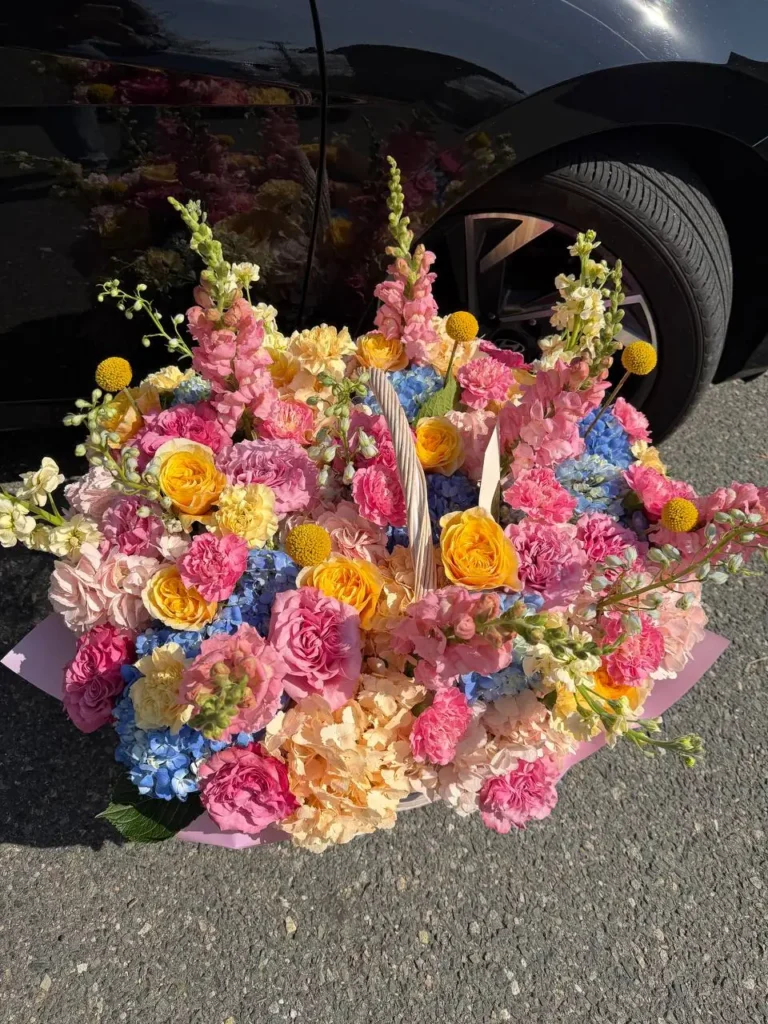 Luxury dopamine floral basket arrangement by Boston Flowers for delivery in Boston
