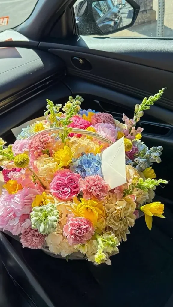Luxury dopamine floral basket arrangement by Boston Flowers for delivery in Boston
