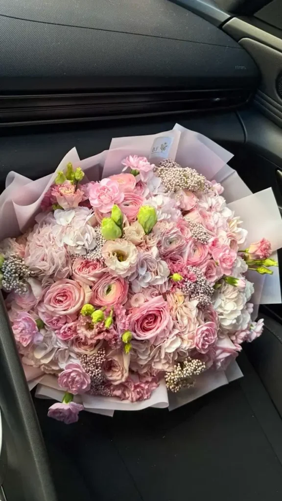 Luxury grand rose and ranunculus mixed bouquet arrangement by Boston Flowers for delivery in Boston