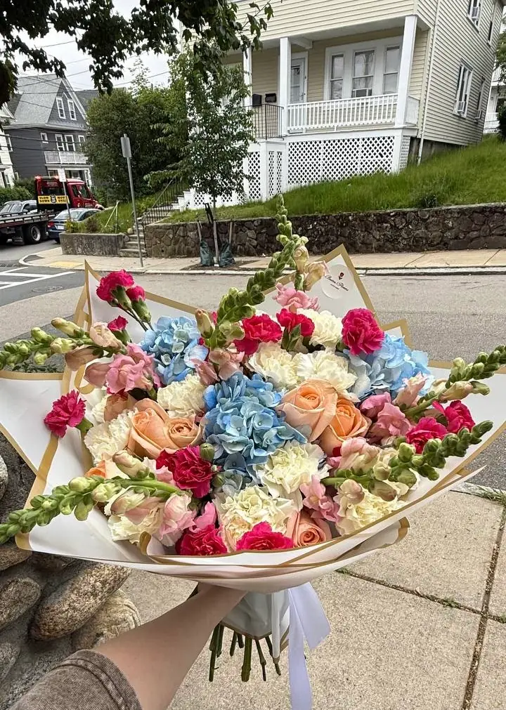 Luxury peach roses and blue hydrangeas bouquet arrangement by Boston Flowers for delivery in Boston
