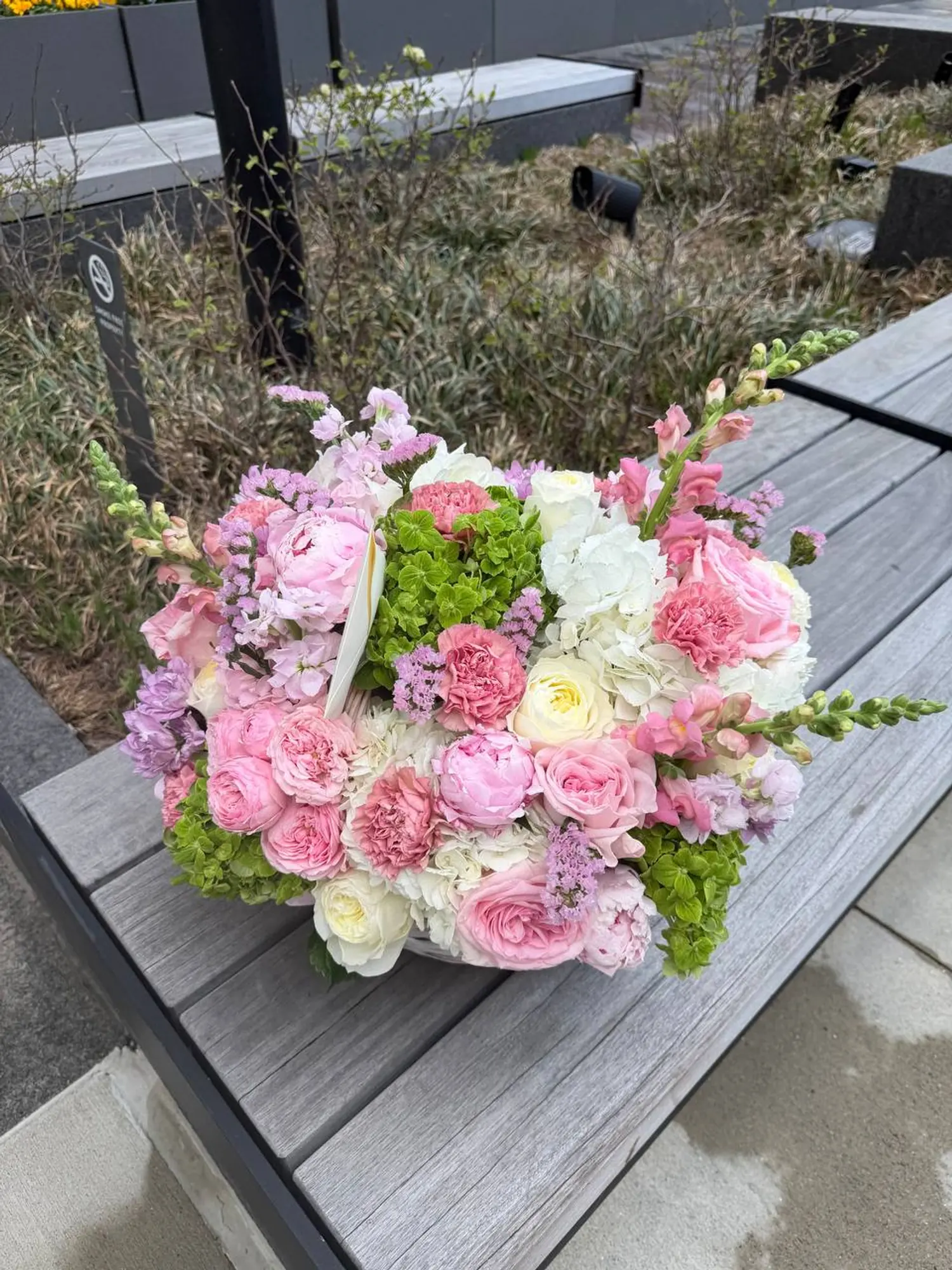 Pink Garden Basket with roses, hydrangeas, and seasonal blooms by Boston Flowers, detail view 3