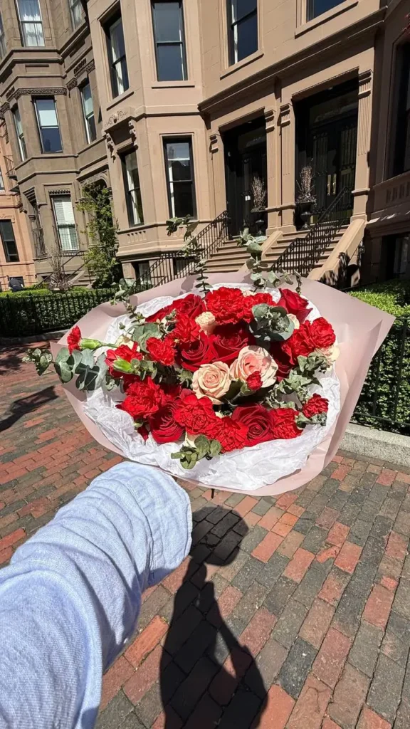 Luxury red and peach roses mixed bouquet arrangement by Boston Flowers for delivery in Boston