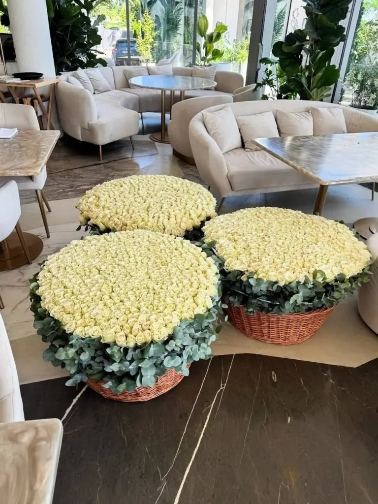 Luxury trio of grand white rose baskets arrangement by Boston Flowers for delivery in Boston