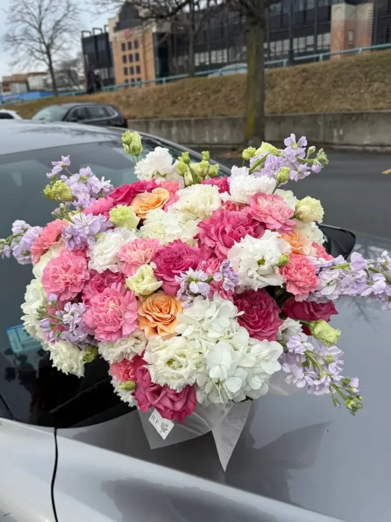 Brookline Meadow Serenade Garden Roses, Hydrangeas, Mixed Flowers bouquet in White, Cream & Ivory and Blush, Pink & Pastel and Yellow & Orange / Vibrant and Purple, Lavender & Violet for premium flower delivery in Boston