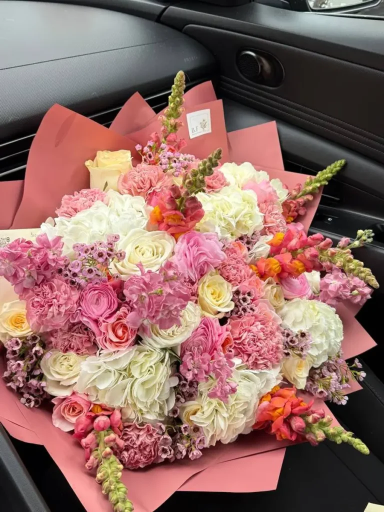 Nantucket Summer Coral Roses, Garden Roses, Hydrangeas, Ranunculus & Anemones, Mixed Flowers bouquet in White, Cream & Ivory and Blush, Pink & Pastel and Yellow & Orange / Vibrant for premium flower delivery in Boston