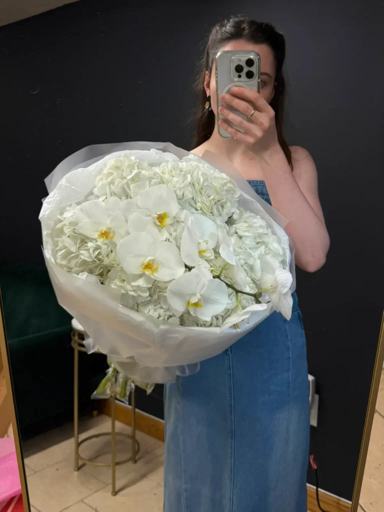 Beacon Hill Ivory bouquet of white hydrangea and white Phalaenopsis orchids in sheer white wrap, view 2