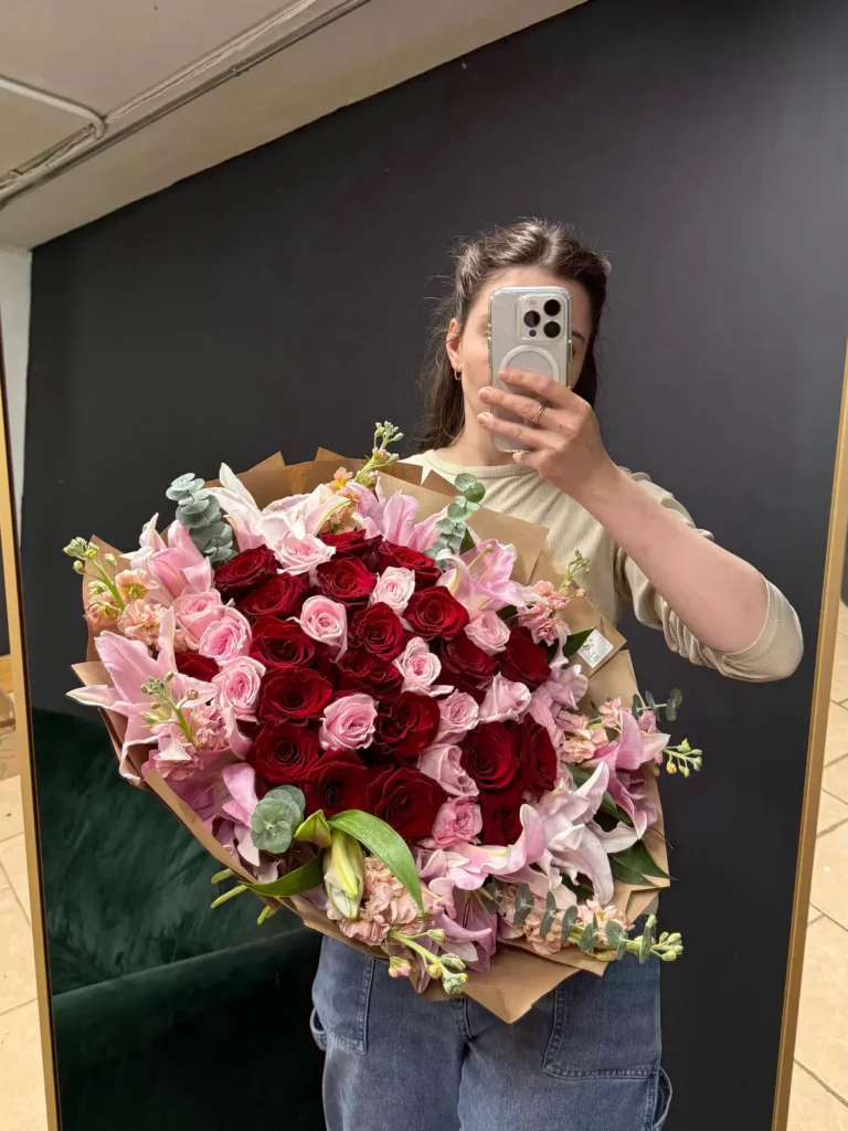 Louisburg Square Romance grand bouquet of crimson roses, blush spray roses and pink oriental lilies in kraft paper, view 2