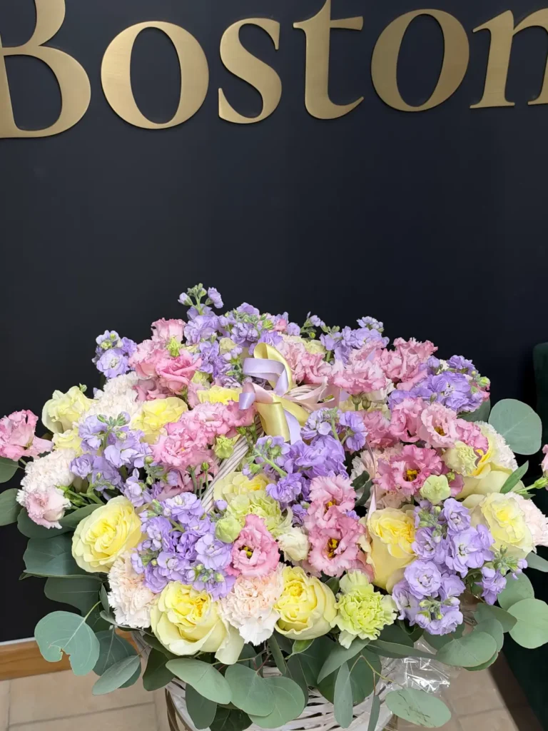 New England Lilac Garden pastel flower basket with yellow roses, pink lisianthus, lavender stock and eucalyptus